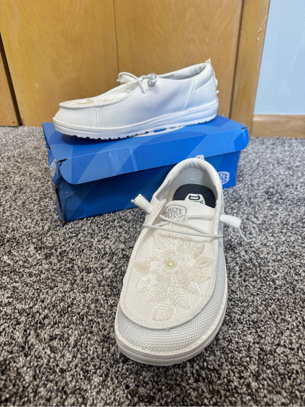 Women’s size 11 Wide Hey Dude White Slip-On Sneakers with Custom Floral Design.